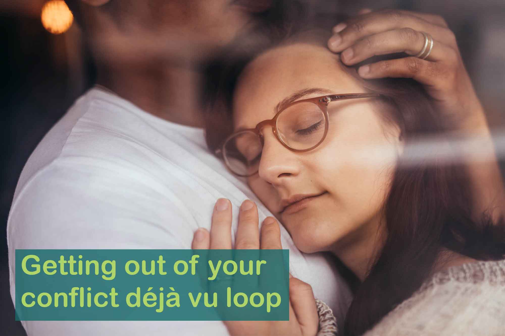 deja-vu-loop-couple-mixed-race-couple-hold-me-tight Mixed race couple holding each other hight with title getting out of your conflict deja vu loop hold me tight Seattle